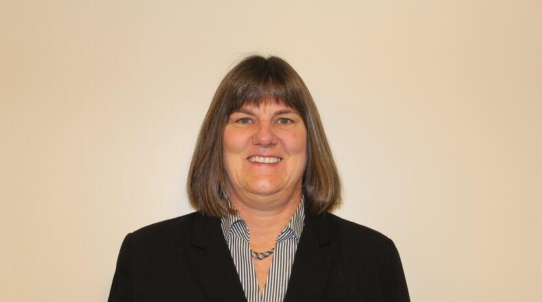 Oakwood school officials have named Julia Belden as the district s new chief financial officer/treasurer.