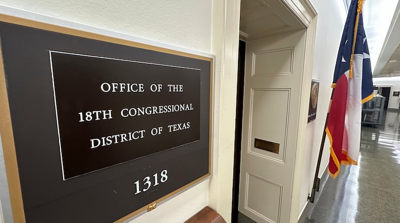 FILE - A Texas flag is on display outside the office of the state's 18th Congressional District, Sept. 2, 2025. (AP Photo/Robert Yoon, file)