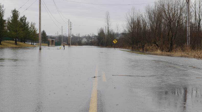 Factory Road in Beavercreek Twp. is closed today due to high water. NICK GRAHAM/STAFF