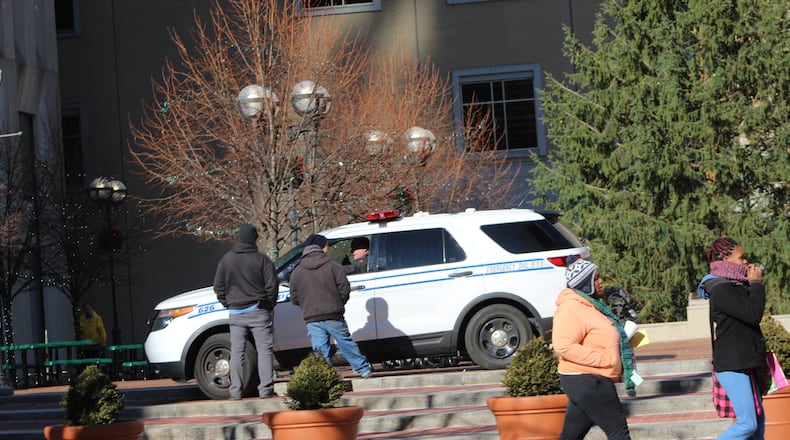 A Dayton police vehicle was parked at Courthouse Square in downtown Dayton on Wednesday. CORNELIUS FROLIK / STAFF