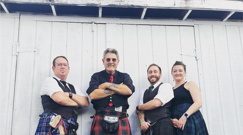 Shawn Hall (left) and his father, Joey Hall (second from left), formed Father Son and Friends in 1989. Thirty-five years later the Dayton-based group remains as busy as ever.