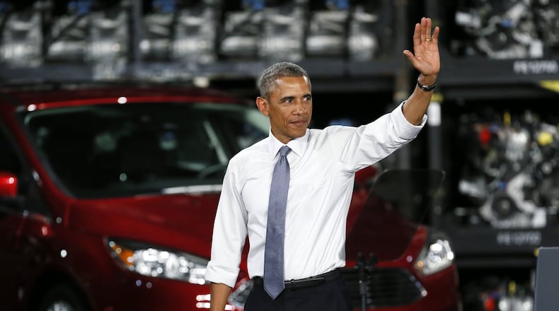 The big issues that will determine President Barack Obama’s legacy include the auto bailout, Obamacare, unrest in the Middle East and continued discontent over the economy. Here Obama waves to the audience at the Ford Michigan Assembly Plant in Wayne, Mich., Wednesday, Jan. 7, 2015. Calling the 2009 federal auto bailout a success story, Obama touted steps taken by his administration that he said have brought the economy and U.S. manufacturing roaring back to life. (AP Photo/Paul Sancya)