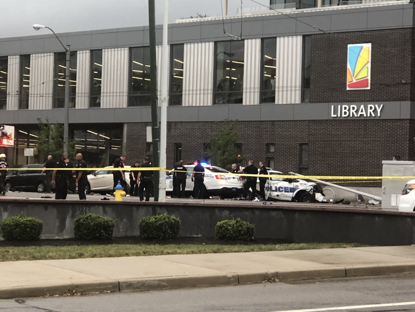 Police cruisers involved in accident near Main Library