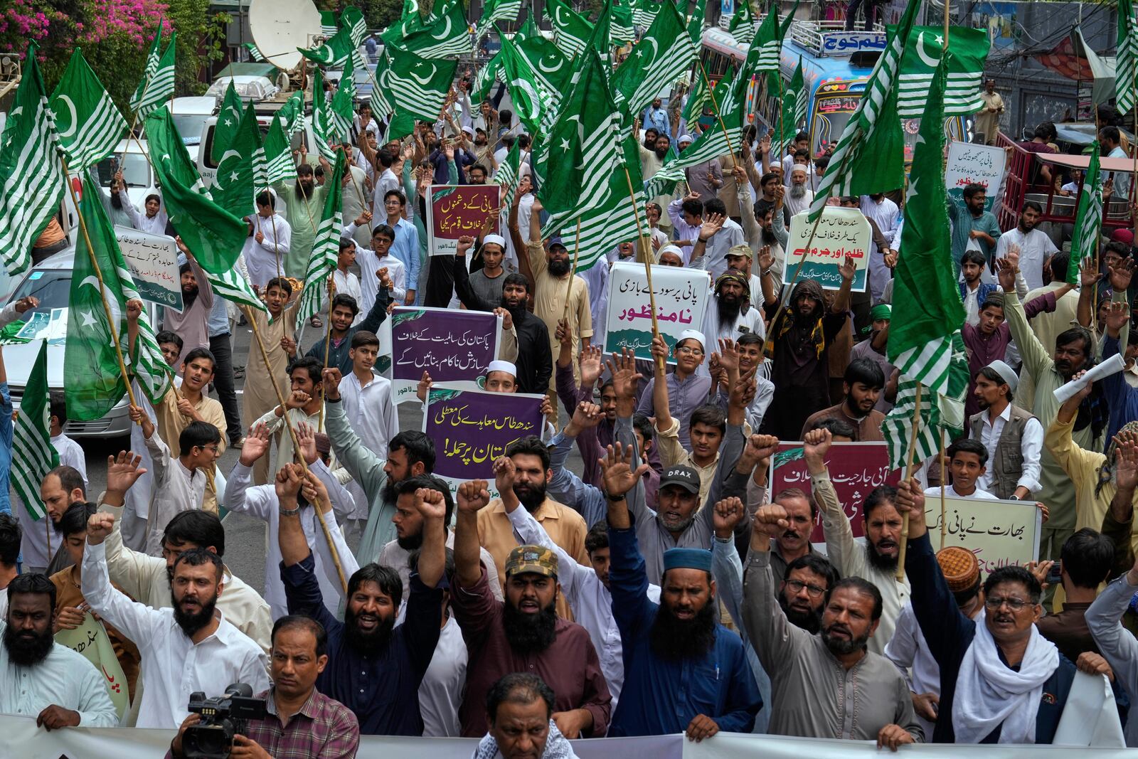 Supporters of the Pakistan Murkazi Muslim League party chant slogans during a demonstration against the suspension of water-sharing treaty by India with Pakistan, in Lahore, Pakistan Thursday, April 24, 2025.(AP Photo/K.M. Chaudary)