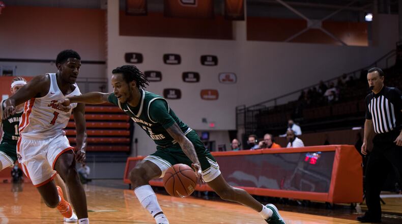 Wright State's Jaylon Hall races past Bowling Green's Justin Turner during Sunday's game at Bowling Green. Joseph Craven/Wright State Athletics