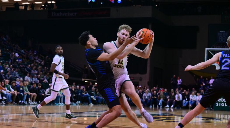 Wright State's Brandon Noel drives against an Air Force defender during a game at the Nutter Center on Nov. 30, 2024. Joe Craven/Wright State Athletics
