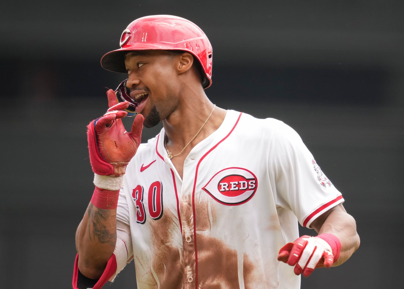 Cincinnati Reds' Will Benson gestures as he rounds the bases after hitting a solo home run during the fifth inning of a baseball game against the Chicago White Sox, Thursday, May 15, 2025, in Cincinnati. (AP Photo/Jeff Dean)