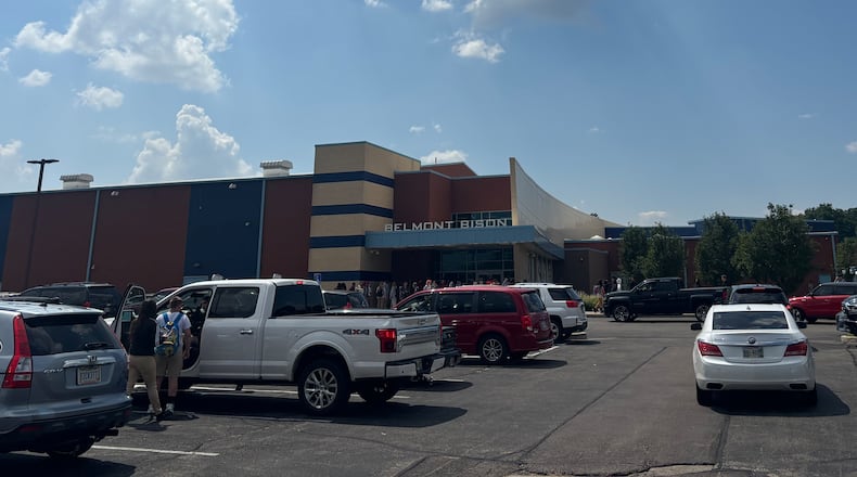 Cars line up outside of Belmont High School in East Dayton to pick up students after school on Friday, Aug. 15. Eileen McClory / Staff
