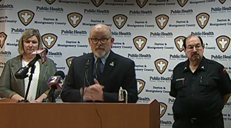 Health Commissioner Jeff Cooper of Public Health - Dayton & Montgomery County speaks during a daily coronavirus update on Thursday, March 19, 2020. At left is Dayton Mayor Nan Whaley and at right is Dave Gerstner of the Regional Medical Response System and Dayton Fire Department EMS.