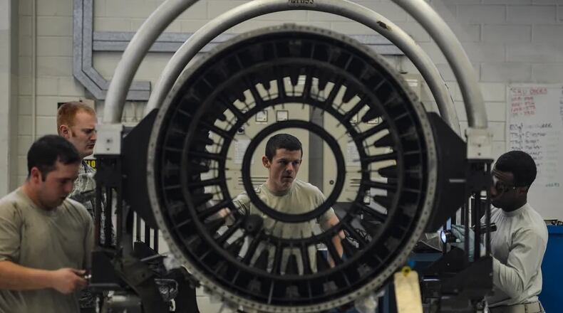 Airmen with the 52nd Aircraft Maintenance Squadron work on a F110 engine overhaul at Spangdahlem Air Base, Germany in this 2016 Air Force photo. (U.S. Air Force Photo by Tech. Sgt. Joshua DeMotts/Released)