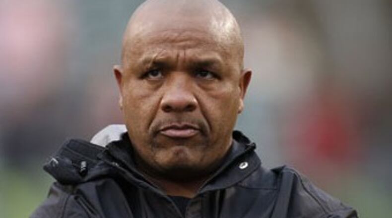 Sunday, Nov. 17, 2013 BENGALS SPORTS : Cincinnati Bengals running backs coach Hue Jackson watches his guys warm up prior to their game against the Cleveland Browns at Paul Brown Stadium. The Enquirer/Jeff Swinger