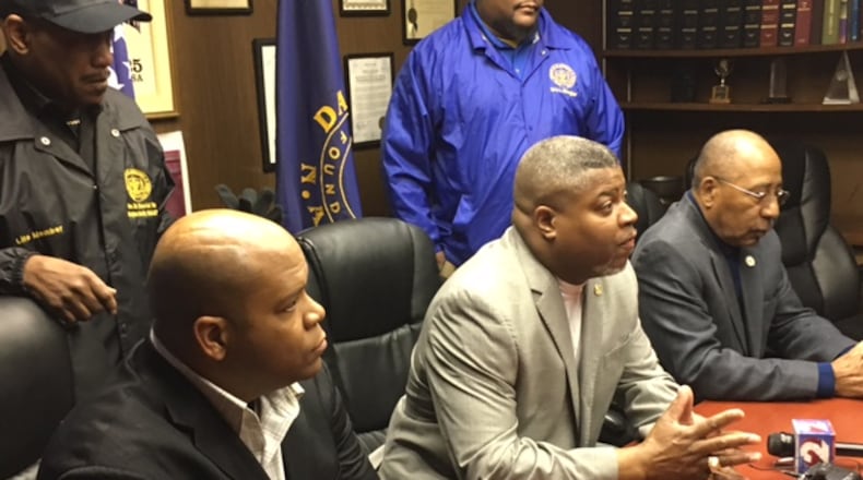 Dayton Unit NAACP President Derrick Foward is flanked by local church leaders Saturday as he talked about the impact the closing of Good Samaritan Hospital will have on people who live in northwest Dayton. NICK BLIZZARD/STAFF