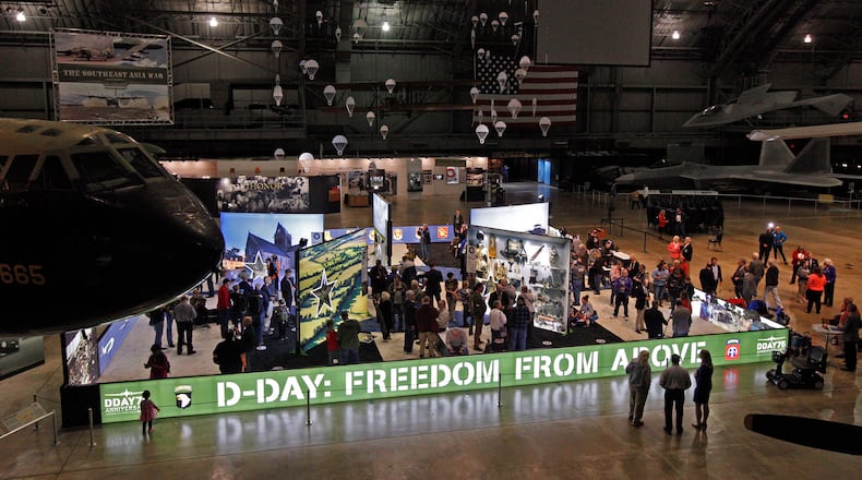 National Museum of the U.S. Air Force opened the new ‘D-Day: Freedom from Above’ exhibit on May 13. The immersive, interactive exhibit commemorates the WWII D-Day invasion in France’s Normandy region. Tablet computers running the innovative technology ‘HistoPad’, designed by the French company Histovery, can be rented for $5 to trace the journey that Allied paratroopers took into battle. (CMGO photo/Ty Greenlees)
