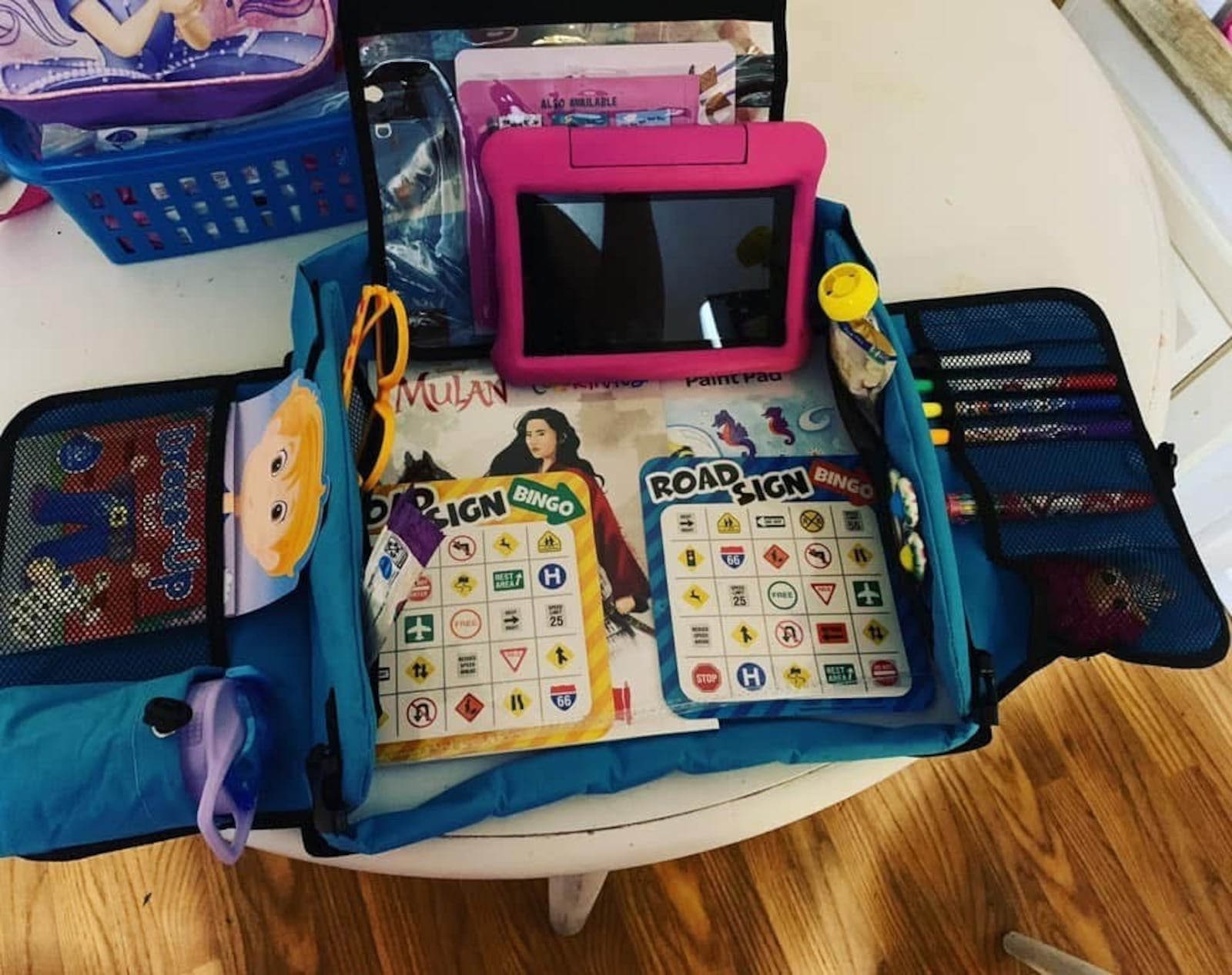 A car tray comes in handy filled with activities to help kids pass the time on road trips. CONTRIBUTED PHOTO