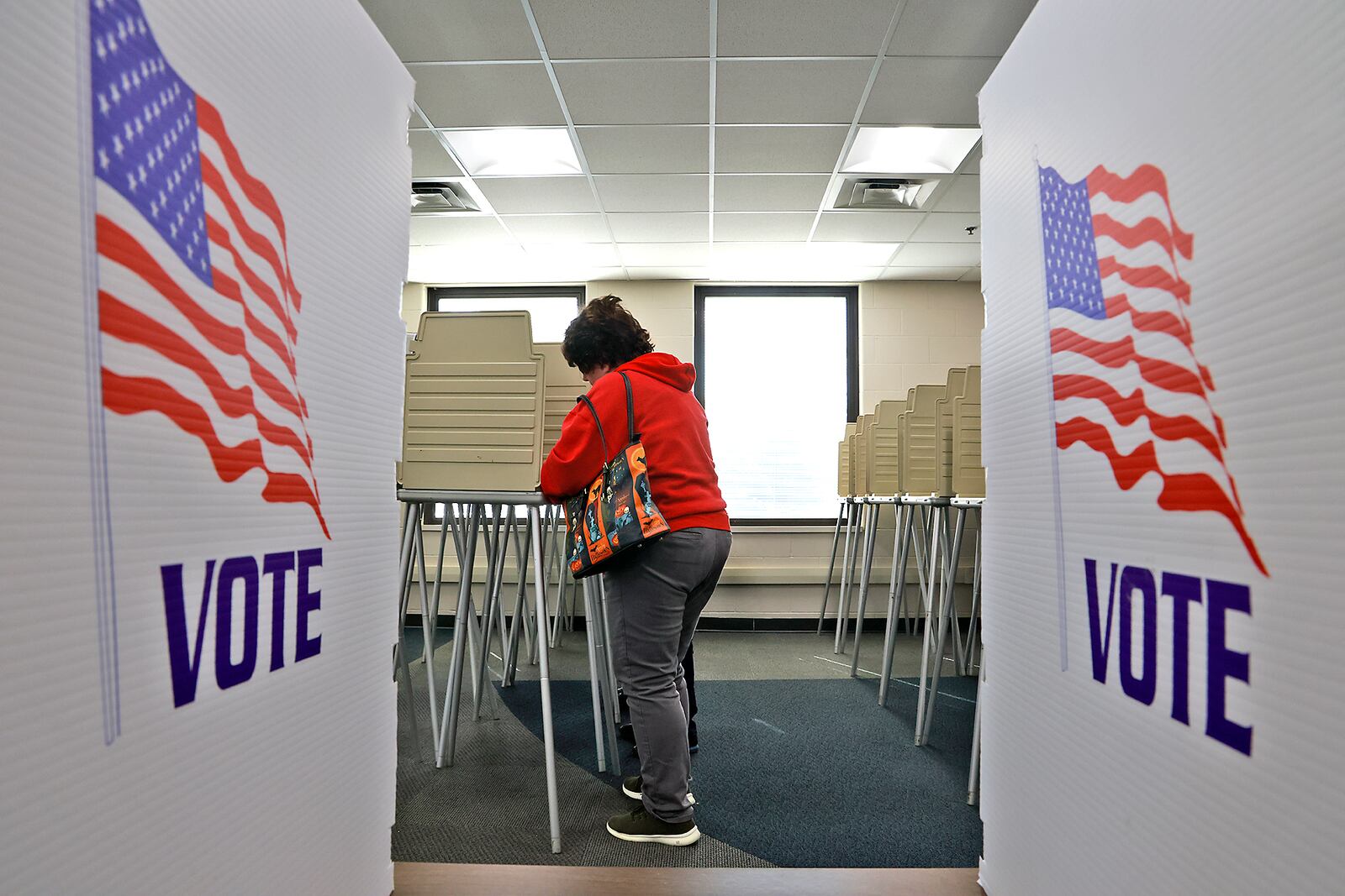 An early voter fills out their ballot Thursday, Oct. 17, 2024 at the Clark County Board of Elections. BILL LACKEY/STAFF