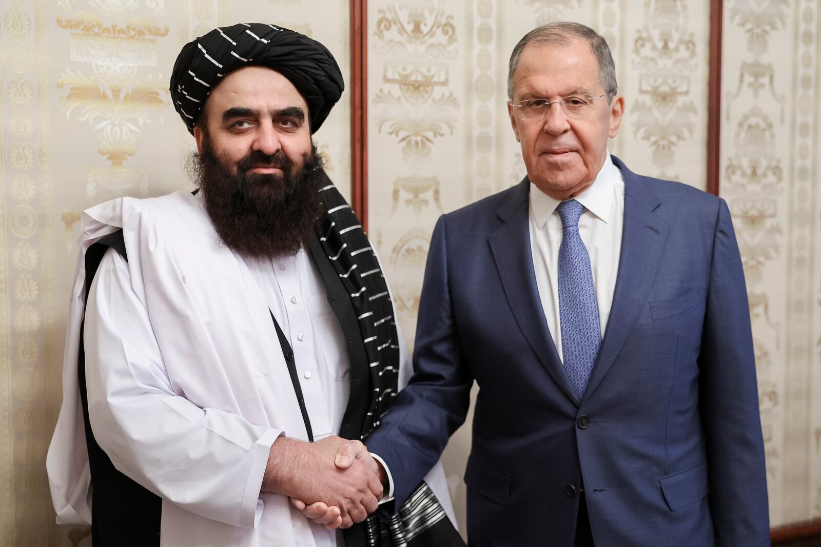 FILE - In this photo released by Russian Foreign Ministry Press Service on Oct. 4, 2024, Russian Foreign Minister Sergey Lavrov, right, and Acting Foreign Minister of Afghanistan's Taliban movement Amir Khan Muttaqi pose for a photo prior to their talks in Moscow, Russia. (Russian Foreign Ministry Press Service via AP, File)