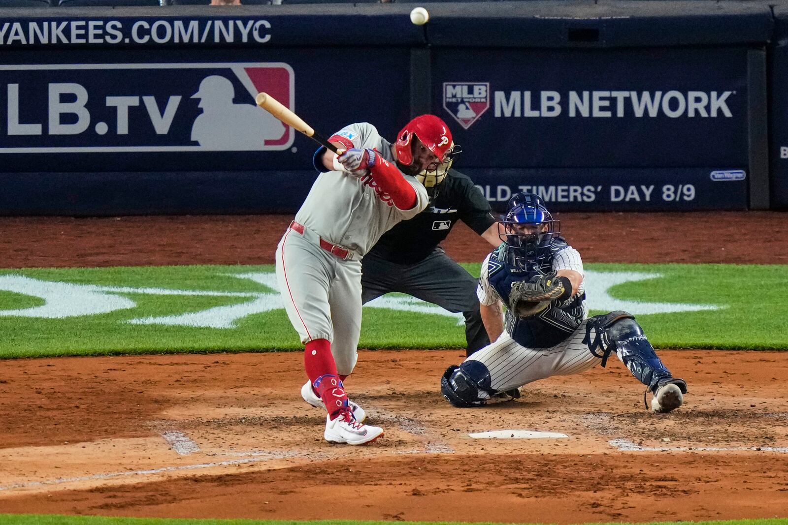 Philadelphia Phillies' Kyle Schwarber hits a two-run home run during the fifth inning of a baseball game against the New York Yankees Friday, July 25, 2025, in New York. (AP Photo/Frank Franklin II)