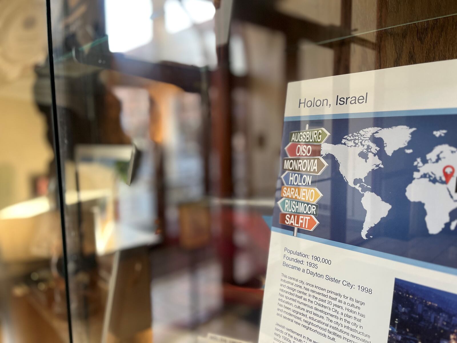 The lobby of Dayton City Hall has information in a display case about Holon, Israel, which is one of Dayton's sister cities. CORNELIUS FROLIK / STAFF
