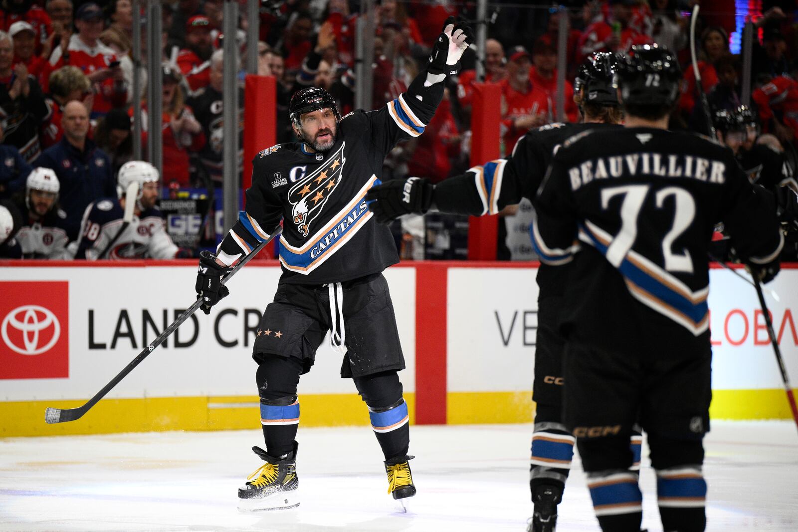 Washington Capitals left wing Alex Ovechkin (8) celebrates his goal during the first period of an NHL hockey game against the Columbus Blue Jackets, Sunday, April 13, 2025, in Washington. (AP Photo/Nick Wass)