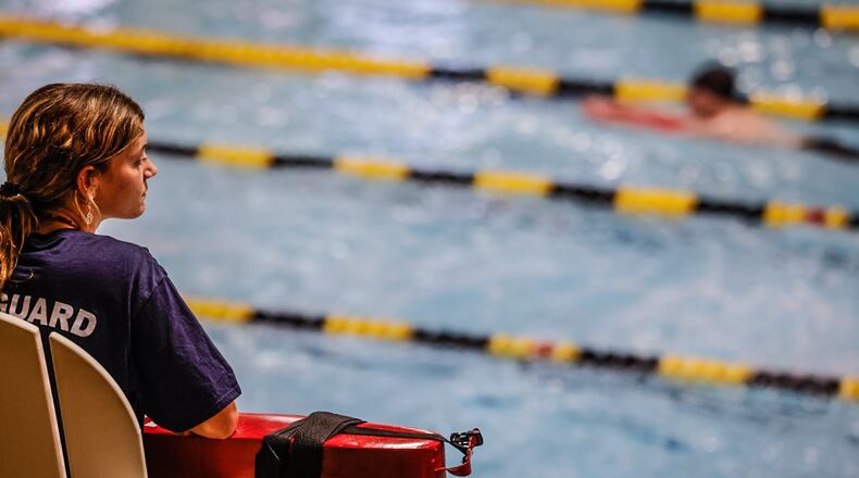 Washington Twp. Centerville RecPlex lifeguard, Molly Wiedemann watches swimmers at the pool Monday January 9, 2023. Washington Twp. will have a levy on the May 2 ballot to help fund the community's recreation department. JIM NOELKER/STAFF
