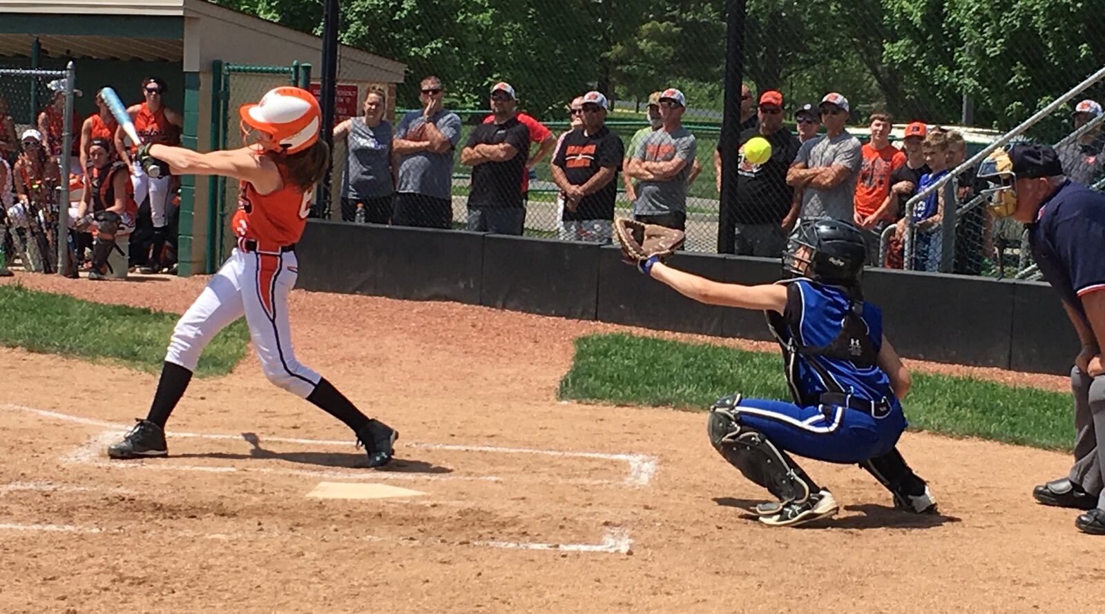 Bradford’s Buzz Brewer fouls a pitch off Cincinnati Christian catcher Ashley Veldkamp’s glove during Sunday afternoon’s Division IV district final at Mason. RICK CASSANO/STAFF