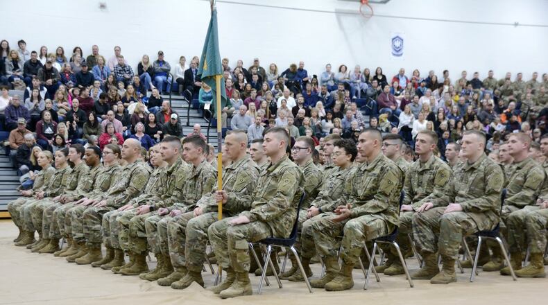 Hundreds of family and friends watched their loved ones during a call of duty ceremony Sunday afternoon, Dec. 8, 2019, at Edgewood Middle School on Trenton-Oxford Road. The soldiers of the 324th Military Police Co. in Middletown will serve a year-long deployment in support of the U.S. Southern Command operations. MICHAEL D. PITMAN/STAFF