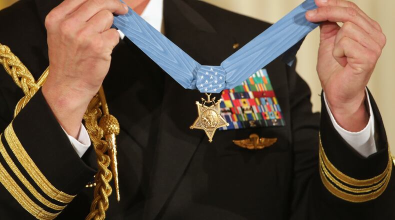 WASHINGTON, DC - FEBRUARY 29:  The Medal of Honor that will be awarded to Navy Senior Chief Edward Byers Jr., is displayed during the ceremony in the East Room of the White House February 29, 2016 in Washington, DC. A member of Navy SEAL Team 6, Byers received the Medal of Honor for his role in rescuing an American hostage from the Taliban in Afghanistan in December 2012.  (Photo by Chip Somodevilla/Getty Images)