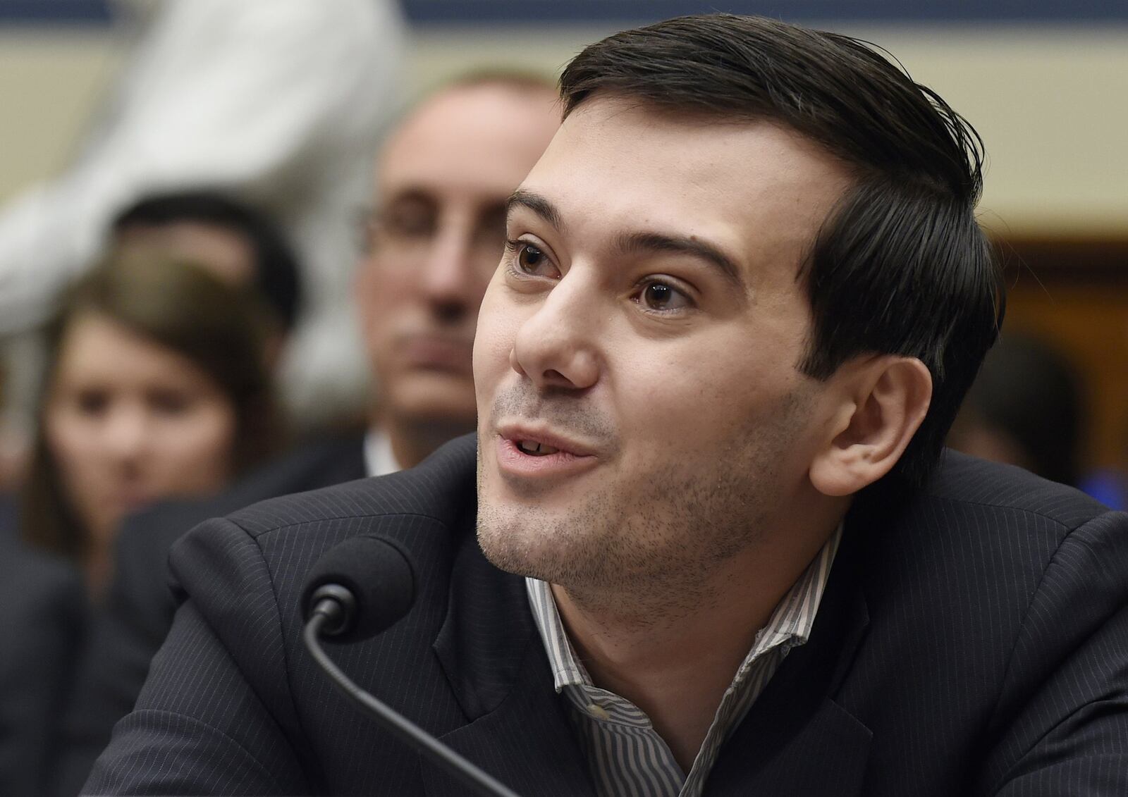 In this Feb. 4, 2016 file photo, pharmaceutical chief Martin Shkreli speaks on Capitol Hill in Washington during the House Committee on Oversight and Reform Committee hearing on a decision by his former company, Turing Pharmaceuticals, to significantly raise the price of the anti-parasitic medication Daraprim. (AP Photo/Susan Walsh, File)