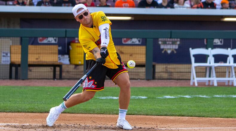 Logan Wilson competes in the home run derby before Wednesday night's Logan Wilson Celebrity Softball Game at Day Air Ballpark. Jeff Gilbert/CONTRIBUTED