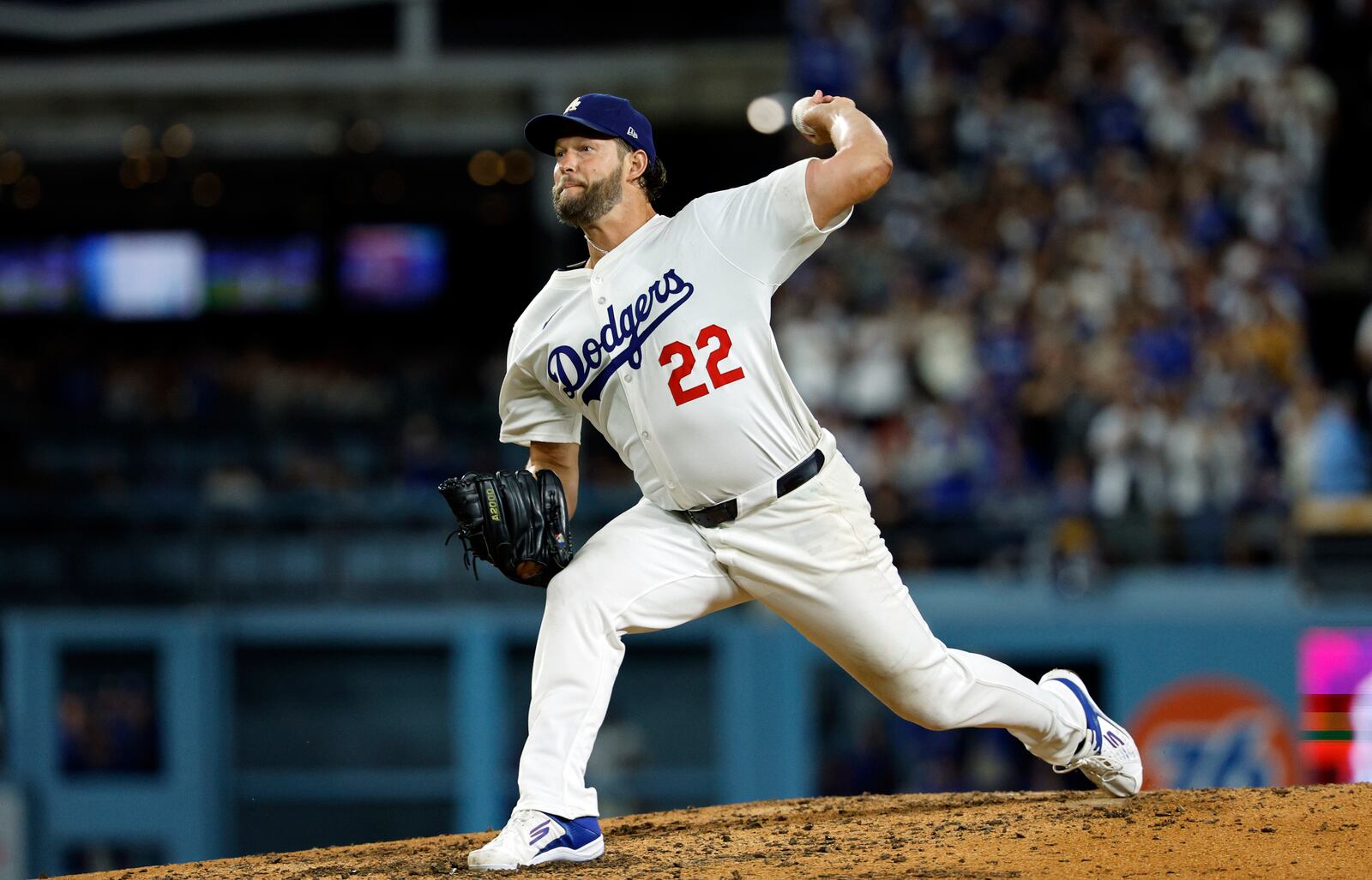 Los Angeles Dodgers pitcher Clayton Kershaw throws against Chicago White Sox's Vinny Capra during the sixth inning to strike him out for his 3,000th career strikeout Wednesday, July 2, 2025, in Los Angeles. (AP Photo/Kevork Djansezian)