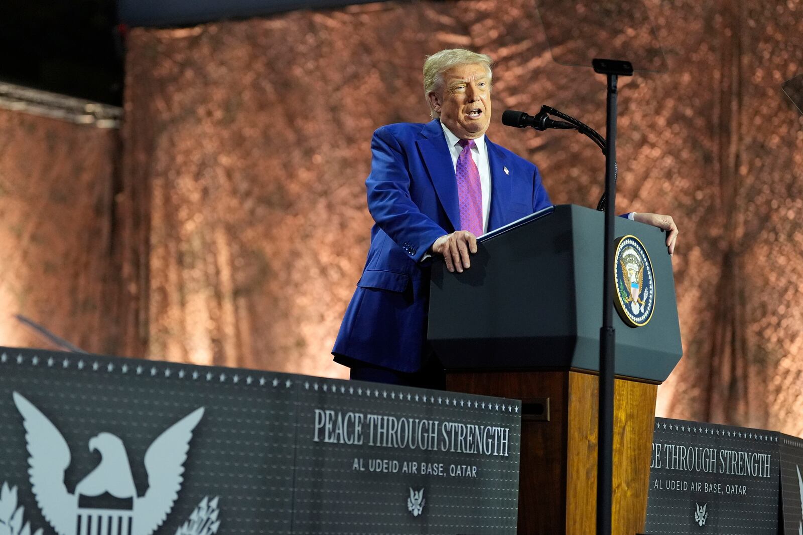 President Donald Trump speaks at the Al Udeid Air Base, Thursday, May 15, 2025, in Doha, Qatar. (AP Photo/Alex Brandon)