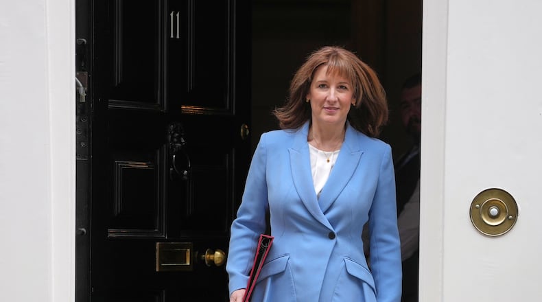Britain's Chancellor of the Exchequer Rachel Reeves leaves 11 Downing Street to deliver the Spring Statement in London, Tuesday, March 3, 2026.(AP Photo/Kin Cheung)