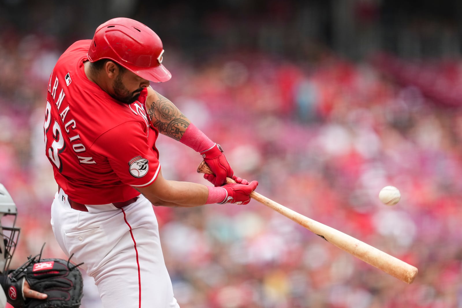 Cincinnati Reds' Christian Encarnacion-Strand hits a three-run home run during the first inning of a baseball game against the Arizona Diamondbacks, Saturday, June 7, 2025, in Cincinnati. (AP Photo/Jeff Dean)