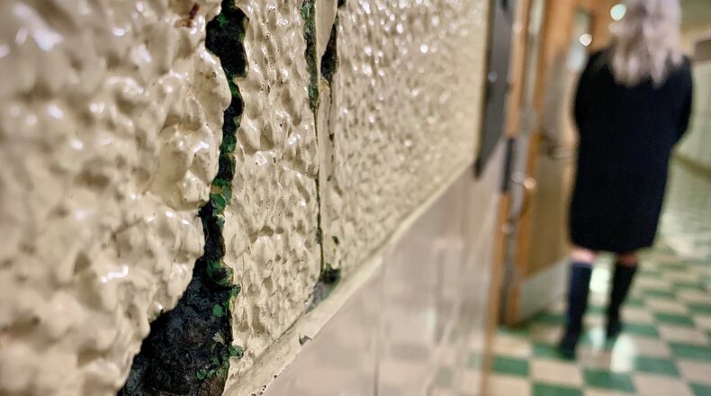 One of the several cracks and holes in the walls at the Broadway Elementary School in Tipp City. MARSHALL GORBY\STAFF