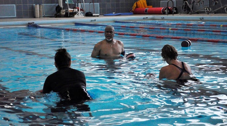 Carl Scott, Wright-Patterson Air Force Base Dodge Fitness Center instructor, teaches a weekly aqua cycling class in the Dodge Fitness Center indoor pool on Thursdays at 11:30 a.m. Classes are also held on Mondays at 6:30 a.m. (U.S. Air Force photo/Karina Brady)