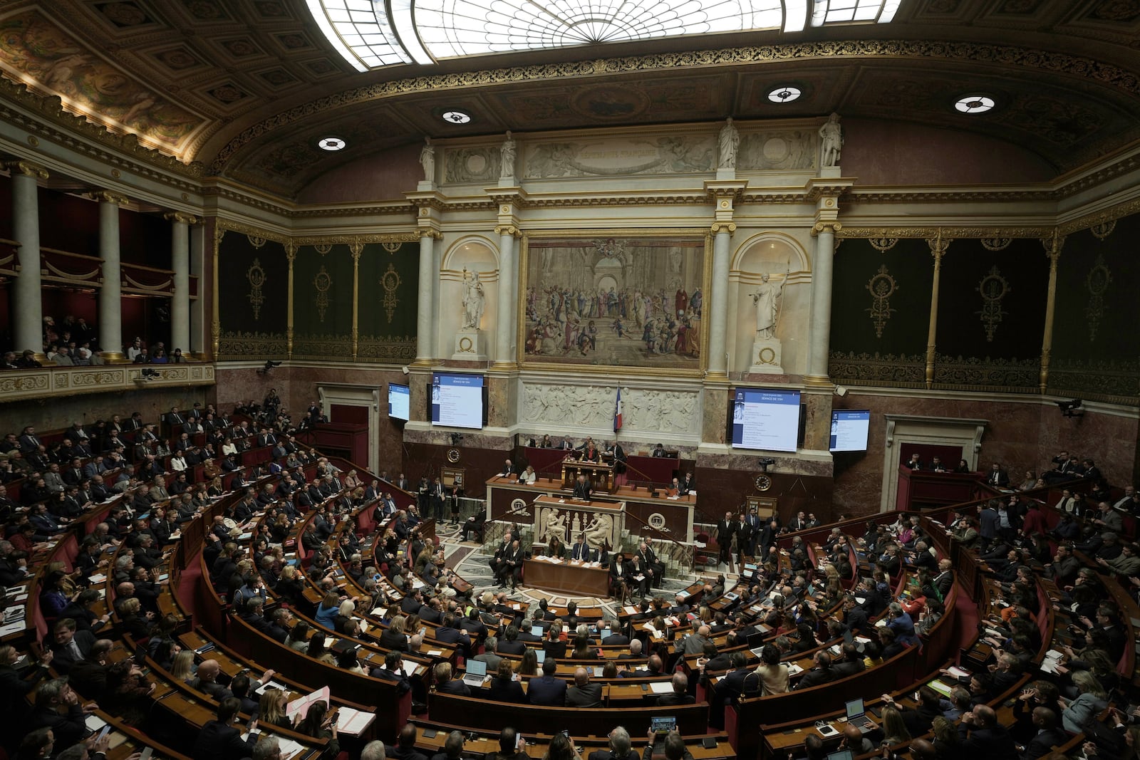 FILE - Lawmakers listen to French Prime Minister Francois Bayrou delivering his general policy speech, Jan. 14, 2025 at the National Assembly in Paris. (AP Photo/Thibault Camus, file)