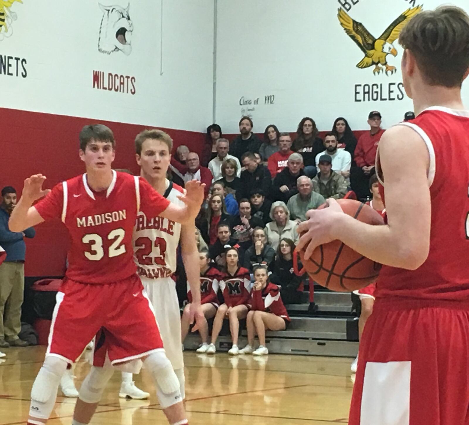 Madison’s Grant Whisman (32) awaits a pass from teammate Tristan Sipple as Preble Shawnee’s Joey Bates (23) defends Friday night at Shawnee. RICK CASSANO/STAFF