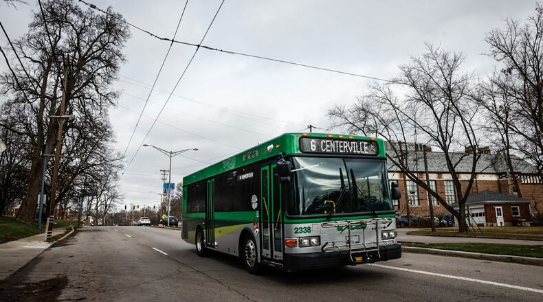 An RTA bus travels south on Far Hills Avenue in Oakwood on Monday Jan. 8, 2024. The Greater Dayton Regional Transit Authority will be removing the overhead trolley wire system for the older-style buses throughout the city of Oakwood. JIM NOELKER/STAFF