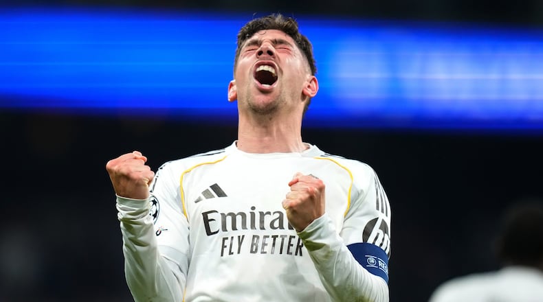 Real Madrid's Federico Valverde celebrates after scoring during a first leg round of 16 Champions League soccer match between Real Madrid and Manchester City in Madrid, Spain, Wednesday, March 11, 2026. (AP Photo/Jose Breton)