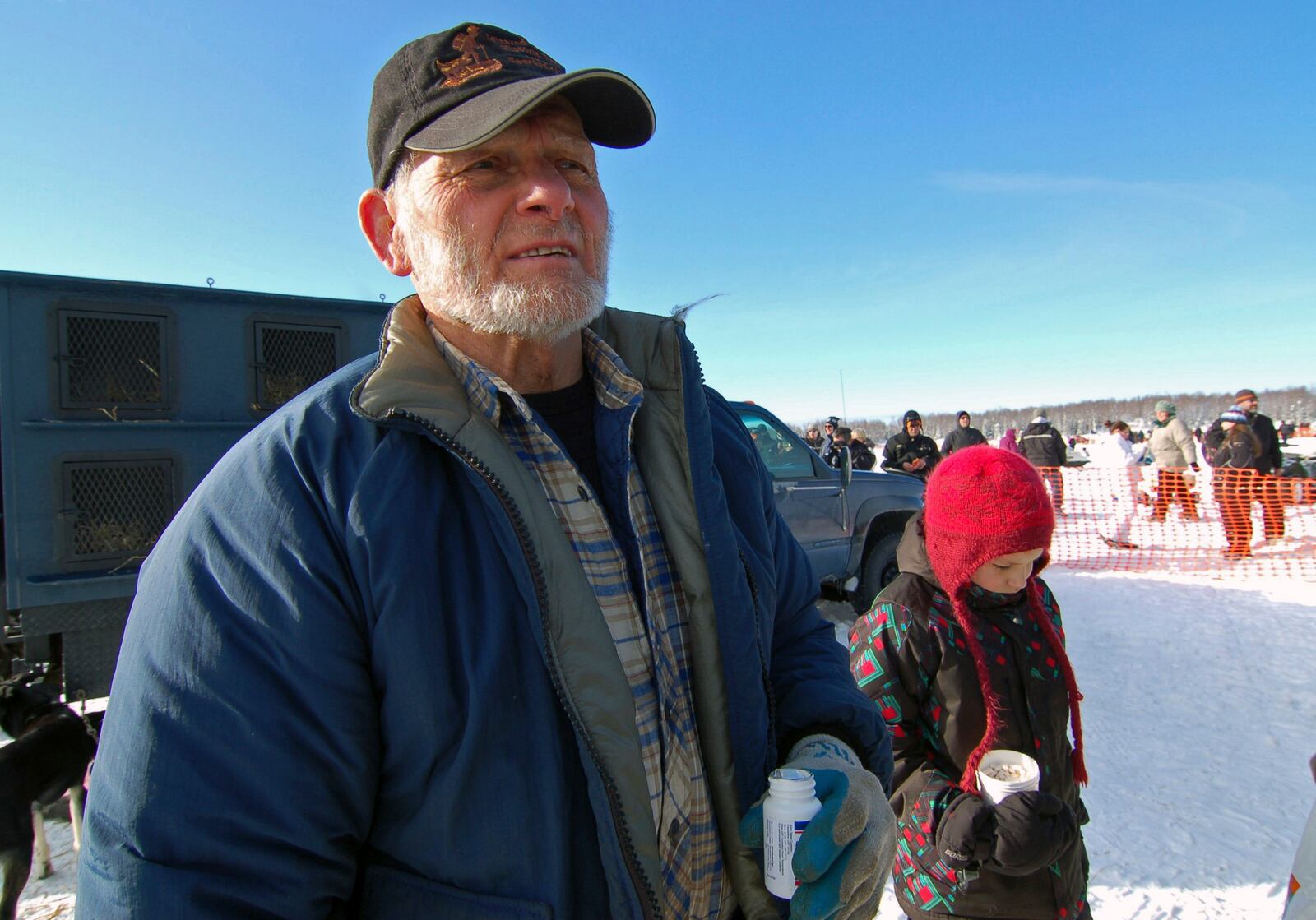 FILE - Veteran musher Dan Seavey, stands at the official start of the Iditarod Trail Sled Dog Race on March 4, 2012, in Willow, Alaska. (AP Photo/Mary Pemberton,File)