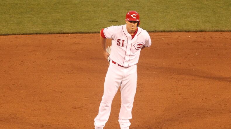 The Reds’ Steve Selsky stands on second after his first career hit, a double against the Cardinals on Wednesday, June 8, 2016, at Great American Ball Park in Cincinnati. David Jablonski/Staff