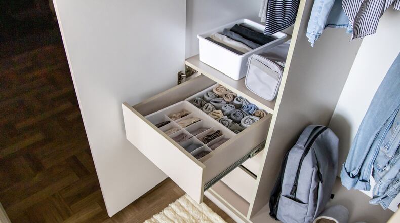 Closet rods, hanging organizers and storage containers can multiply your tiny closet space tenfold. iSTOCK