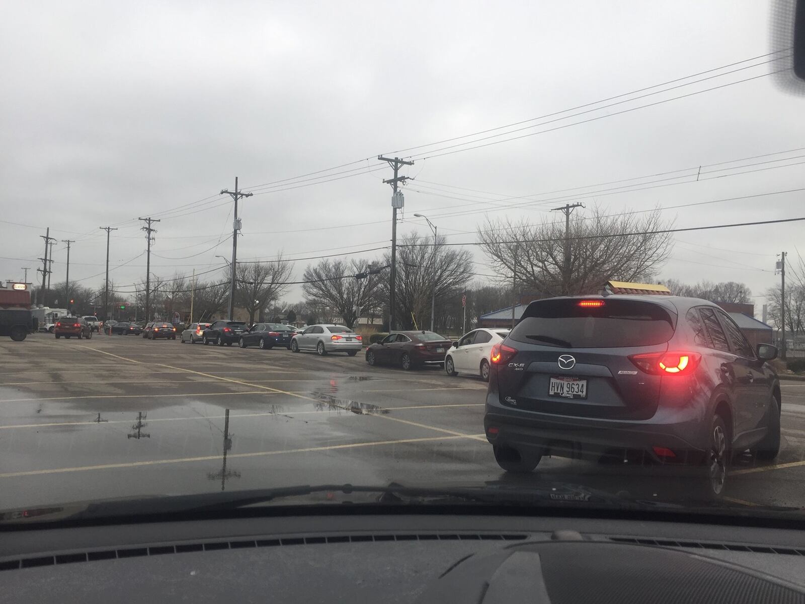 Cars line up to pick up El Meson last week. CONTRIBUTED/ALEXIS LARSEN