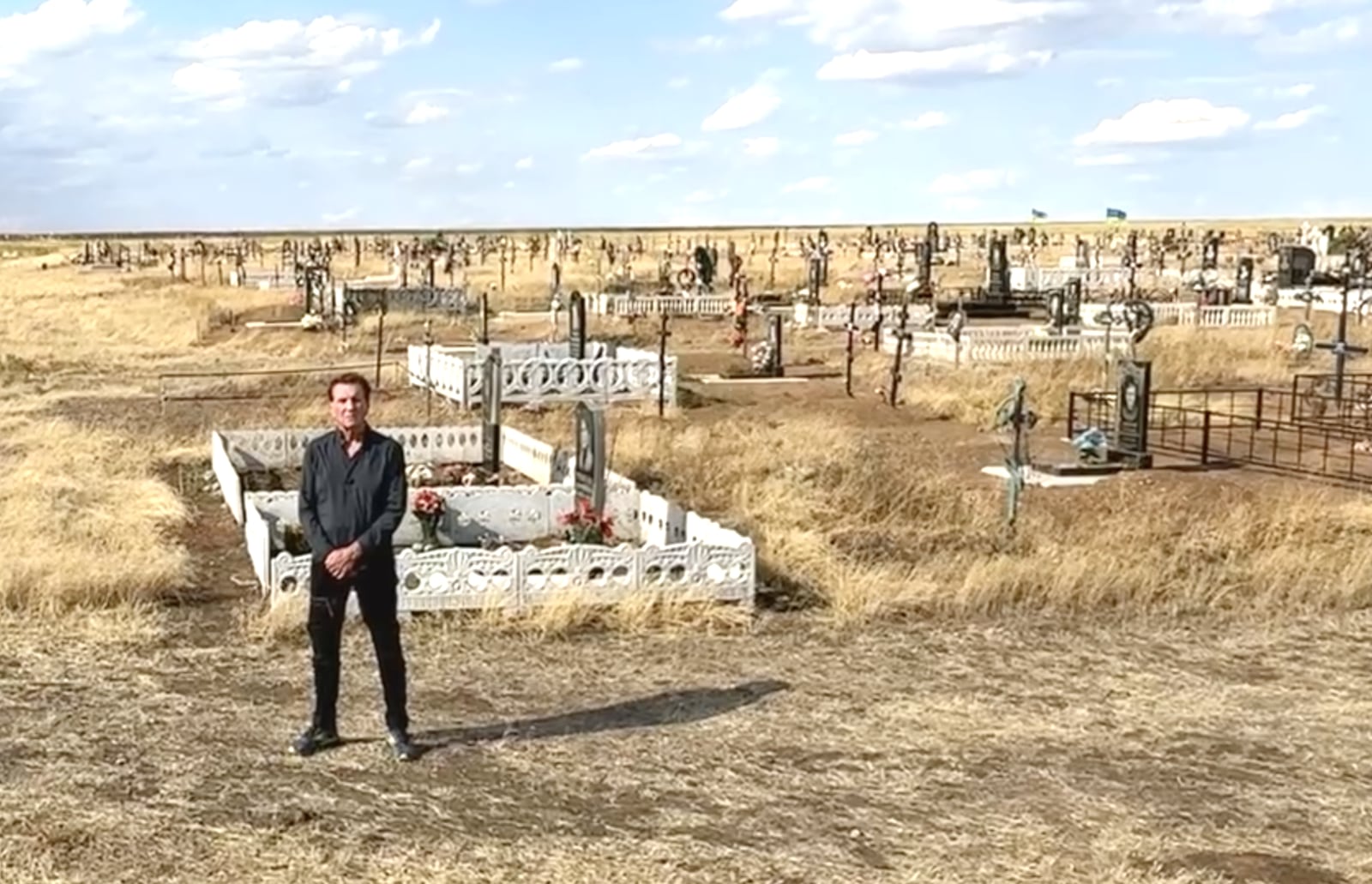 Larry Connor in the cemetery at Snihurivka, a town that was seized early in the war by invading Russian forces, but retaken by the Ukrainians 10 months later. Connor said the fields surrounding the cemetery are filled with land mines placed by the Russians. (Contributed Photo)
