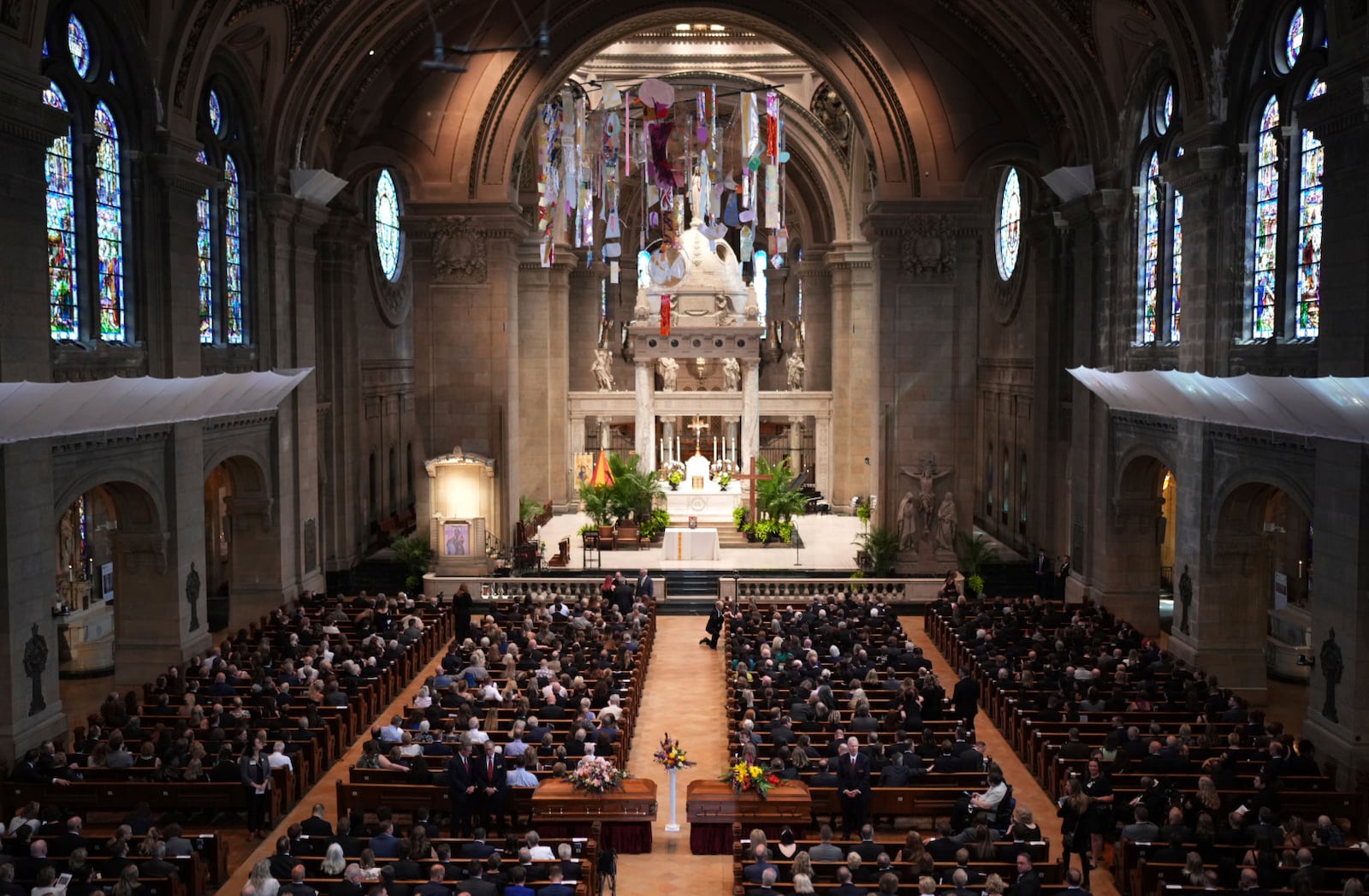Attendees take their seats before funeral services for Mark and Melissa Hortman at the Basilica of St. Mary in Minneapolis, Minn., on Saturday, June 28, 2025. (Jeff Wheeler/Star Tribune via AP, Pool)