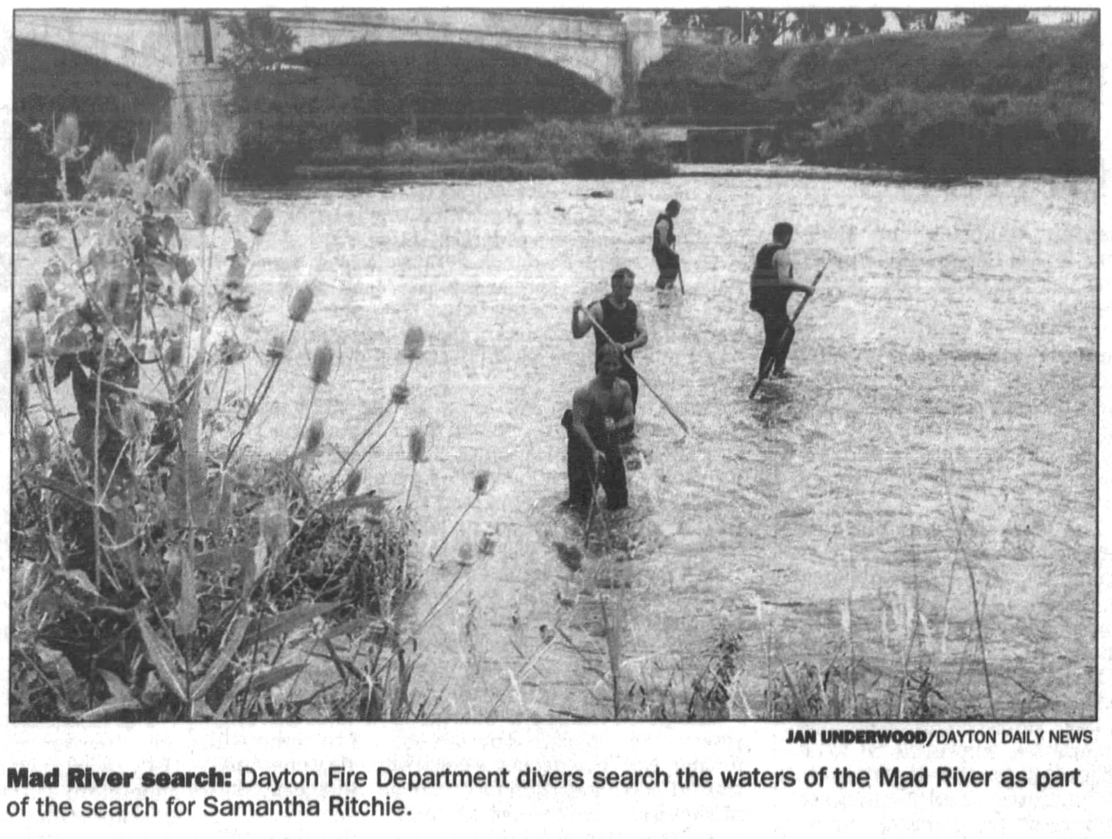 Dayton fire fighters search Mad River while looking for Samantha Ritchie in 1995. DAYTON DAILY NEWS ARCHIVES