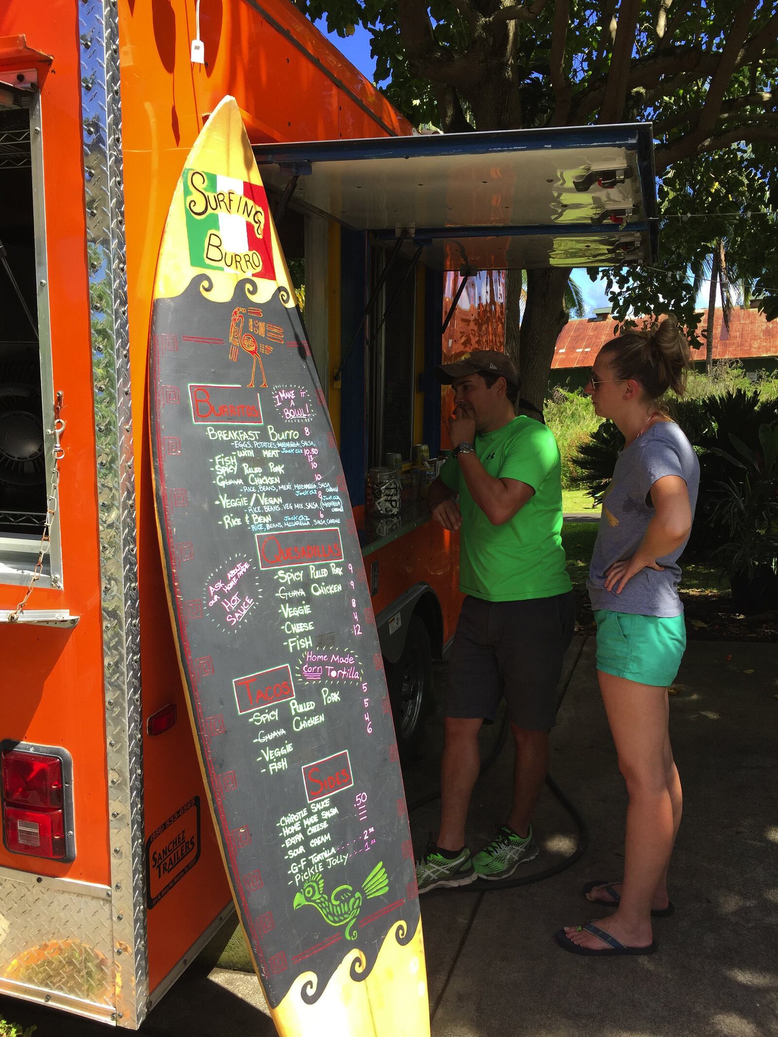 On island time at Hana's Surfing Burro food cart, where the ahi tacos are completely worth the wait. (Bethany Jean Clement/The Seattle Times/TNS)