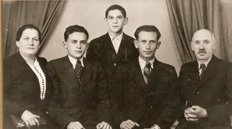 Larry (Laszlo Klein) is second from the left. The family is, in order, Gizella Berncsweig-Klein (mother), Laszlo Klein (Larry), Endre Klein (younger brother), Gyorgy Klein (older brother) and Sandor Klein (father). CONTRIBUTED