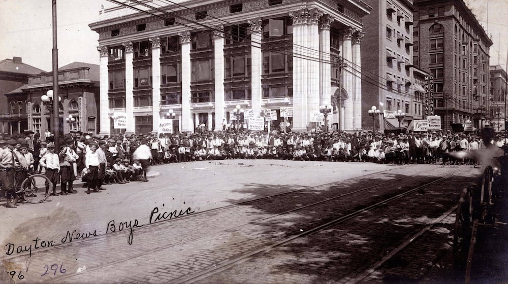 News boys gather in front of the Dayton Daily News building in this early undated photograph. Construction of the Dayton Daily News building was completed in 1910. DAYTON METRO LIBRARY LUTZENBERGER PICTURE COLLECTION