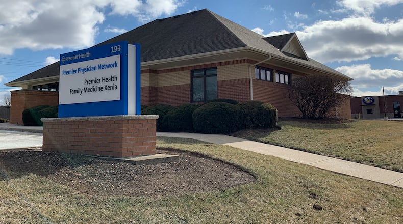 Exterior shot of office property at 193 Progress Drive in Xenia, with a sign for Premier Health out front.